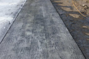 Cement Ramps and Sidewalks - We are concrete contractors offering paving, construction and repair of driveways, sidewalks, ramps, curbs, and more.